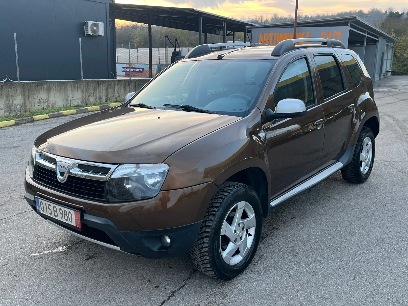 Dacia Duster 1.6i 4x4, снимка 1