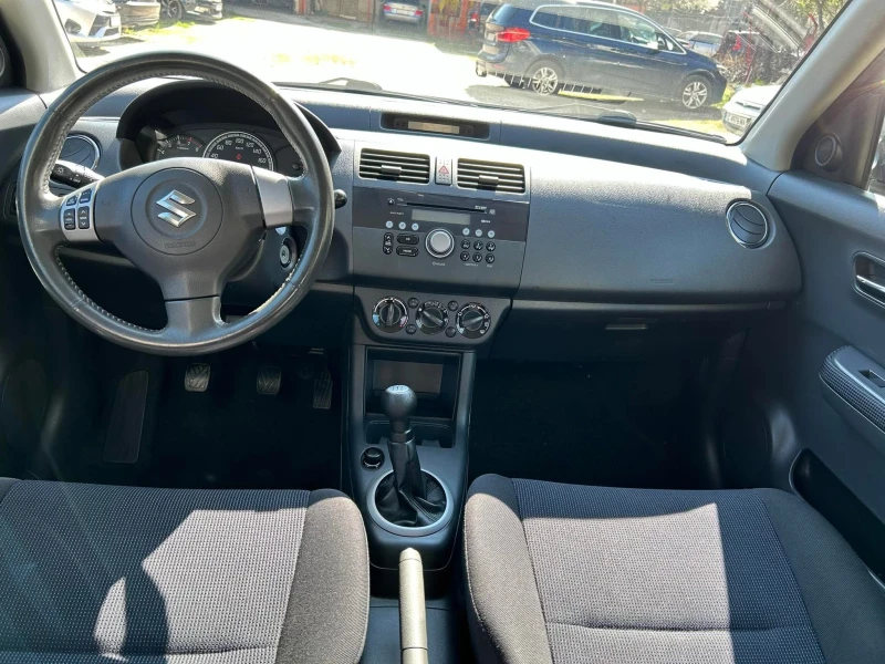 Suzuki Swift 1.3 4x4, снимка 16 - Автомобили и джипове - 52637108