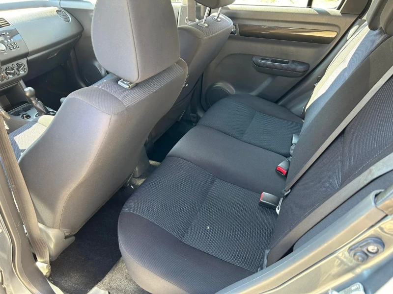 Suzuki Swift 1.3 4x4, снимка 11 - Автомобили и джипове - 52637108