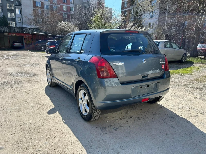 Suzuki Swift 1.3 4x4, снимка 6 - Автомобили и джипове - 52637108