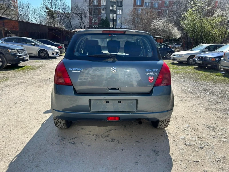 Suzuki Swift 1.3 4x4, снимка 4 - Автомобили и джипове - 52637108