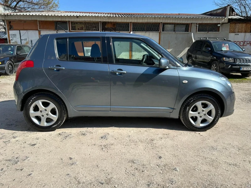Suzuki Swift 1.3 4x4, снимка 7 - Автомобили и джипове - 52637108