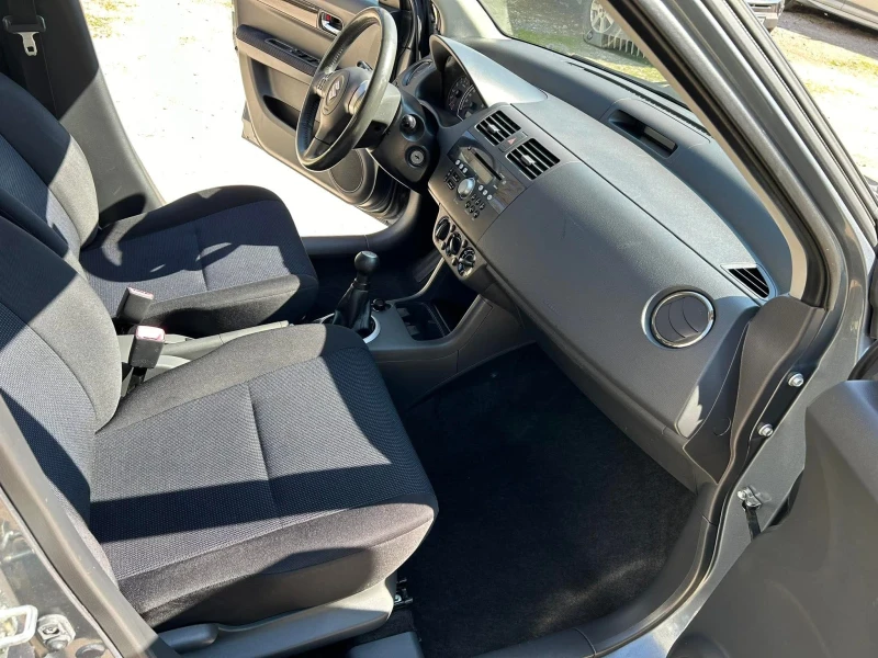 Suzuki Swift 1.3 4x4, снимка 10 - Автомобили и джипове - 52637108