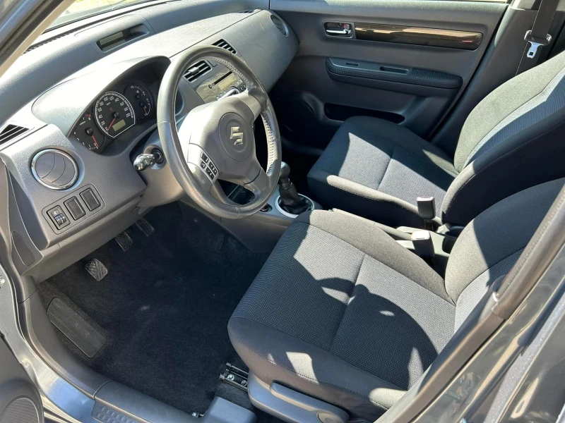 Suzuki Swift 1.3 4x4, снимка 9 - Автомобили и джипове - 52637108
