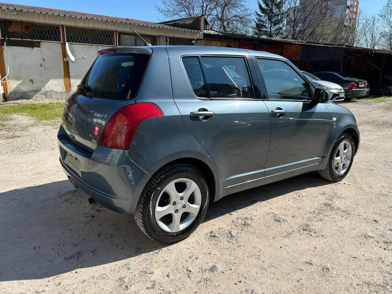 Suzuki Swift 1.3 4x4, снимка 8 - Автомобили и джипове - 52637108