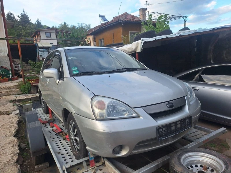 Suzuki Liana, снимка 4 - Автомобили и джипове - 47391546