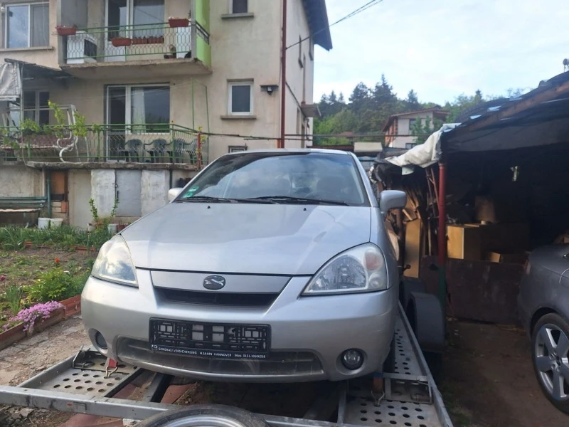 Suzuki Liana, снимка 2 - Автомобили и джипове - 49501411