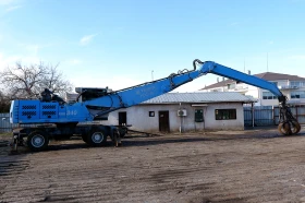 Багер Fuchs 340