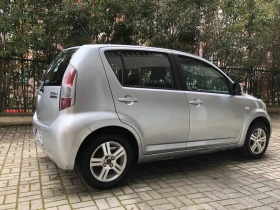 Daihatsu Sirion 1.3 4х4, 91 коня + газ, снимка 5