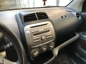 Daihatsu Sirion 1.3 4х4, 91 коня + газ, снимка 15