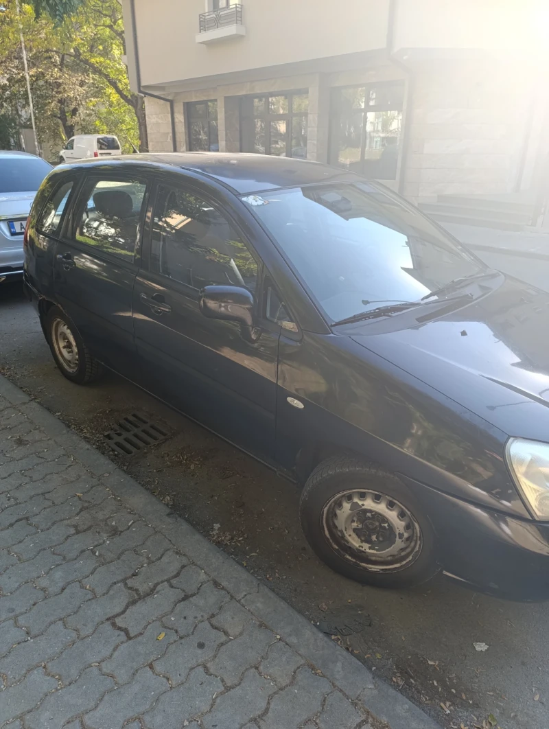 Suzuki Liana, снимка 2 - Автомобили и джипове - 47692870