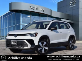 ������ VW Taos