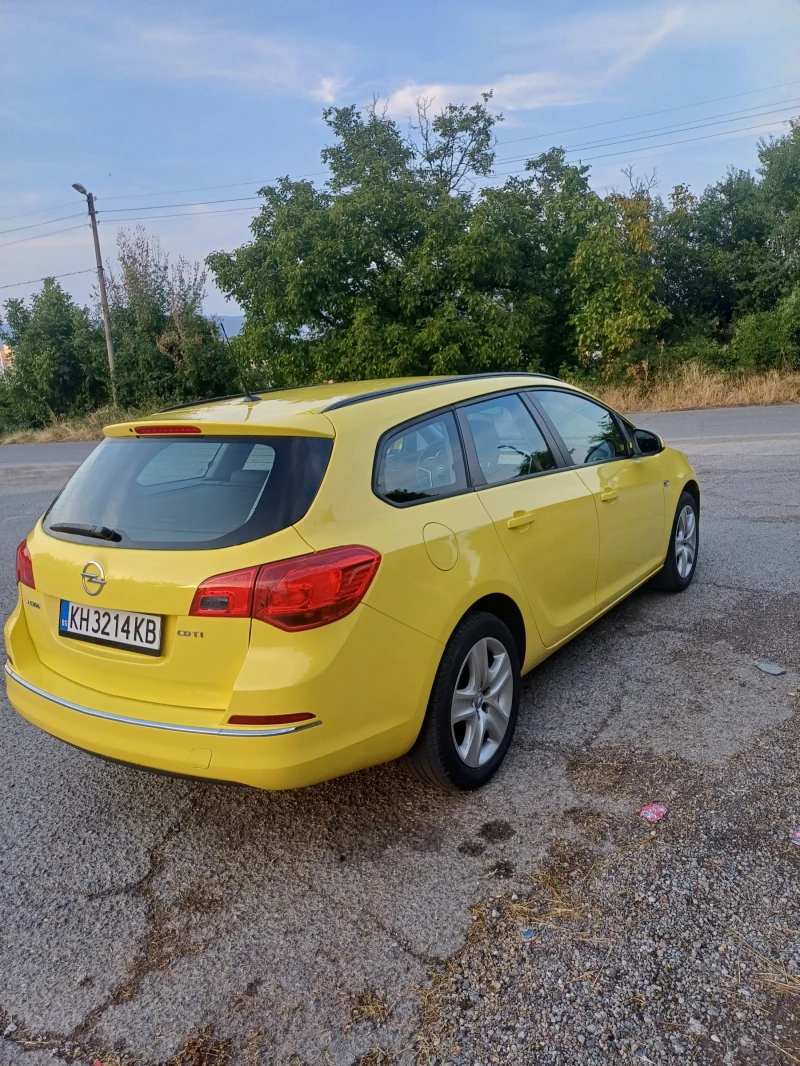 Opel Astra 1.6tdci, снимка 7 - Автомобили и джипове - 48176140