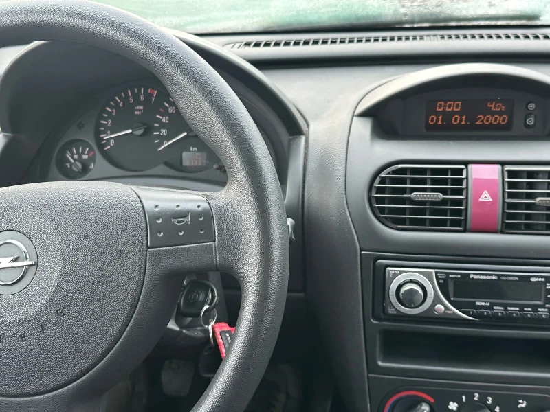 Opel Corsa 1, 0 Германия!, снимка 5 - Автомобили и джипове - 53357104