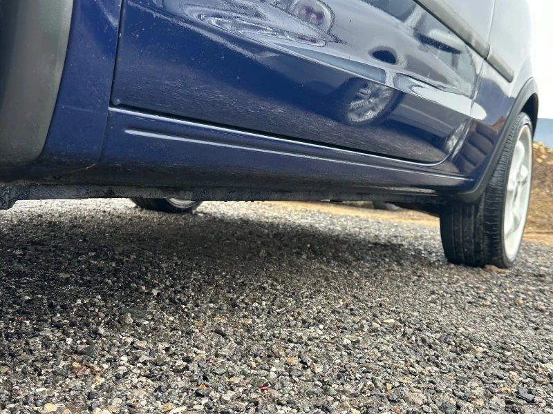 Opel Corsa 1, 0 Германия! Климатик!, снимка 13 - Автомобили и джипове - 53357104