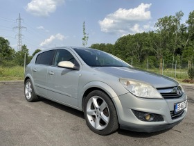 Opel Astra 1.7 COSMO CDTi 101 k.c., снимка 16