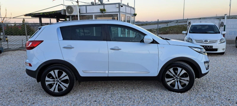 Kia Sportage 2.0 4x4 Navi, снимка 8 - Автомобили и джипове - 52805826