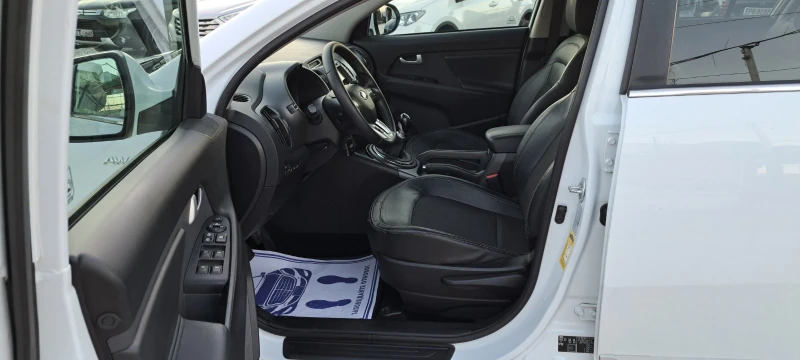 Kia Sportage 2.0 4x4 Navi, снимка 9 - Автомобили и джипове - 52805826