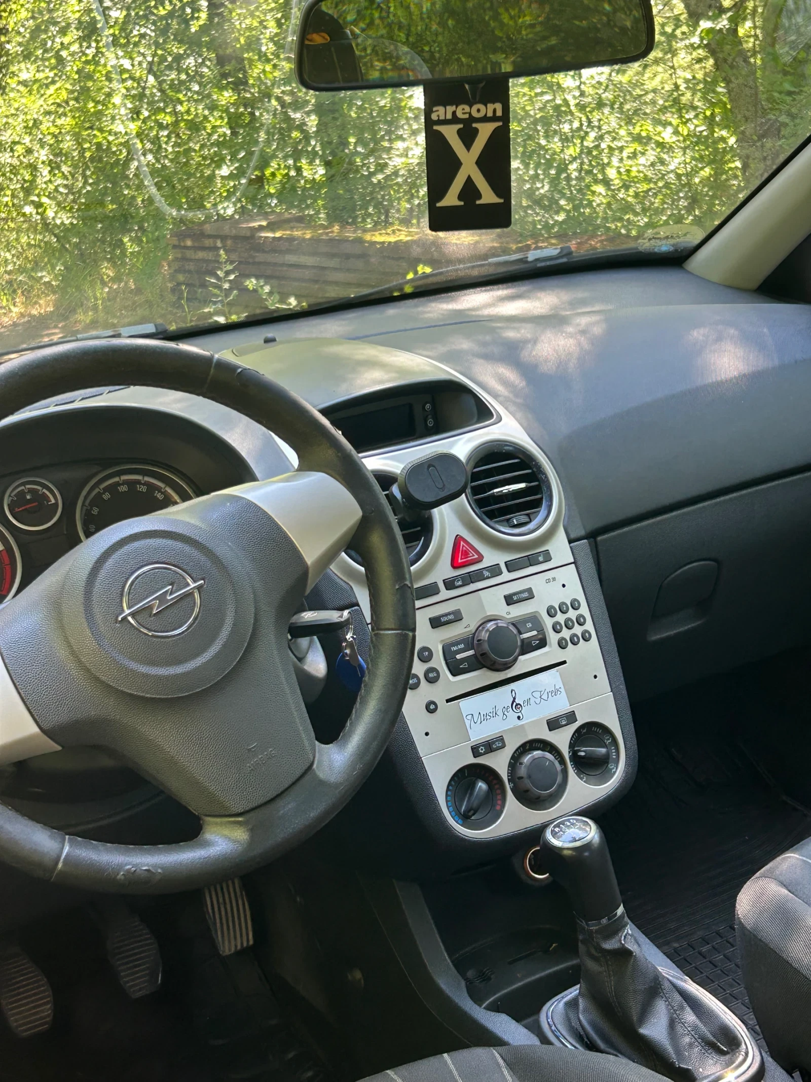 Opel Corsa 1.0 LPG, снимка 7 - Автомобили и джипове - 54974872
