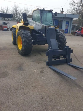 Телескопичен товарач New Holland LM 430 ATPTHC, снимка 9