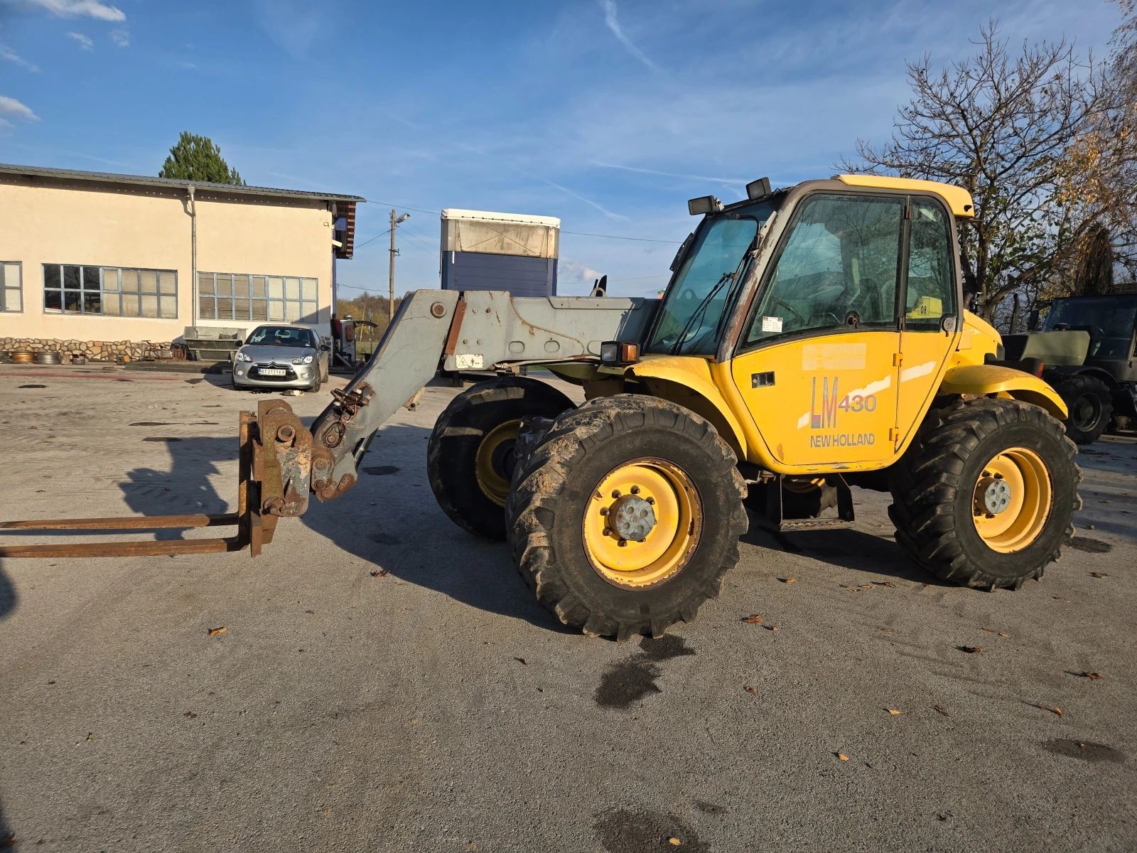 Телескопичен товарач New Holland LM 430 ATPTHC, снимка 1