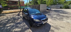 Обява за продажба на Mazda 2 1.4 i ~2 300 лв. - изображение 9 | Auto.bg Обява за продажба на Mazda 2 1.4 i ~2 300 лв. - изображение 9