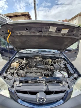 Mazda Tribute 2.0, снимка 16