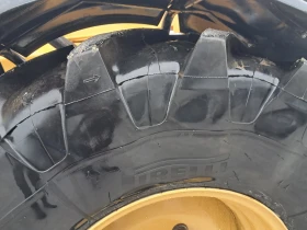 Телескопични товарачи Caterpillar TH407 C, снимка 9