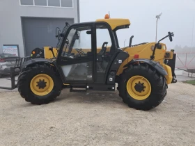 Телескопични товарачи Caterpillar TH407 C, снимка 4
