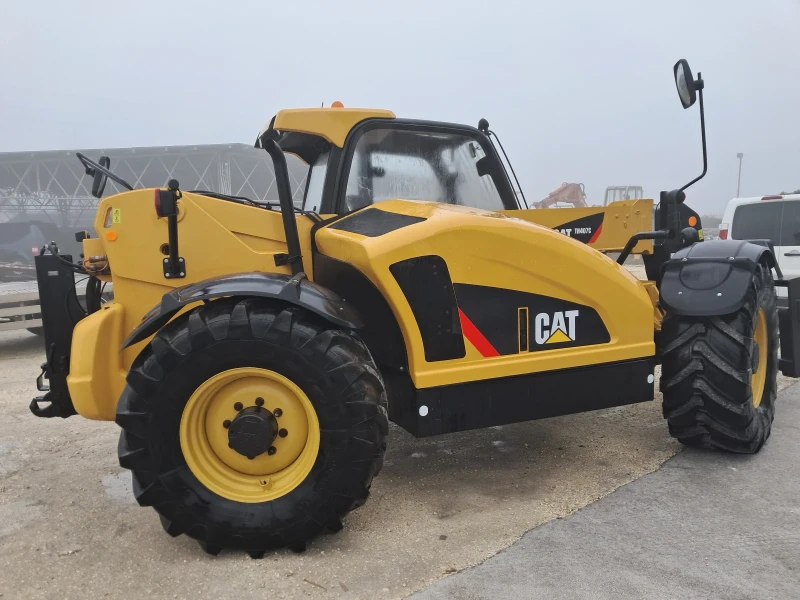 Телескопични товарачи Caterpillar TH407 C