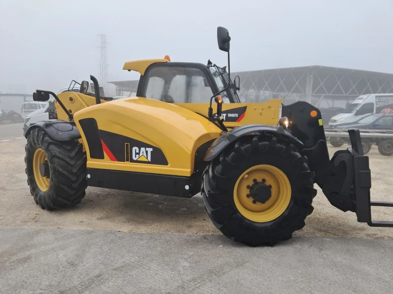 Телескопични товарачи Caterpillar TH407 C, снимка 2 - Индустриална техника - 52840920