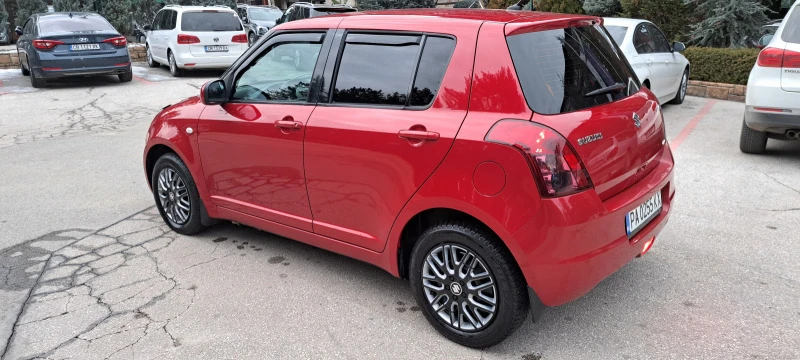 Suzuki Swift 1.3i/4x4/ЛИЗИНГ* Климатик* Подгрев.., снимка 1 - Автомобили и джипове - 44103852