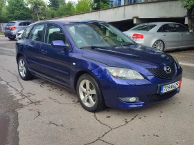     Mazda 3 1.6i-105kc--SPORT-COMFORT-4            