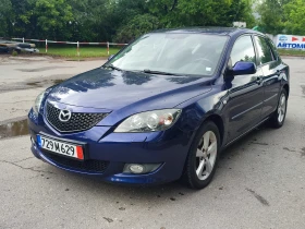     Mazda 3 1.6i-105kc--SPORT-COMFORT-4            