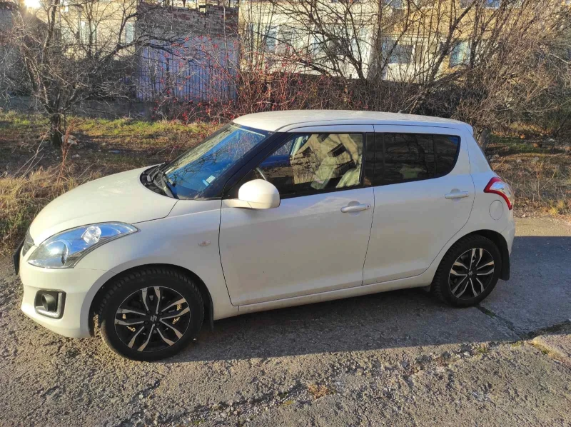 Suzuki Swift 1.3i Special Edition, снимка 7 - Автомобили и джипове - 48116184