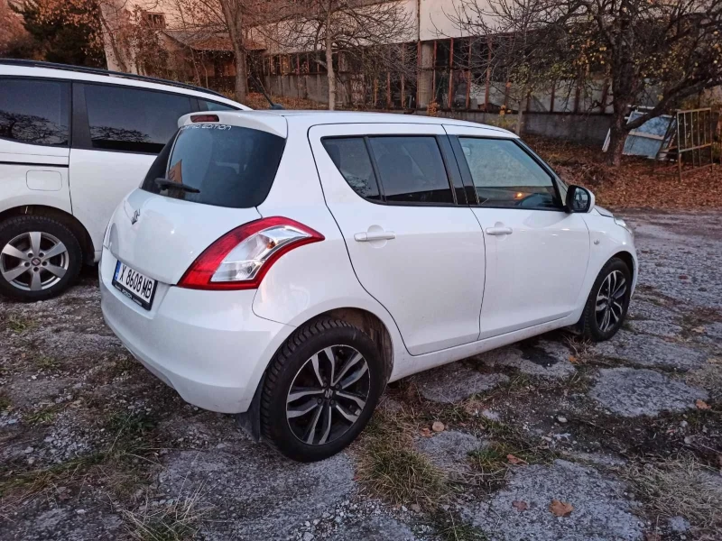 Suzuki Swift 1.3i Special Edition, снимка 16 - Автомобили и джипове - 48116184