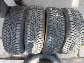 Гуми Зимни 195/65R15, снимка 1 - Гуми и джанти - 44395660