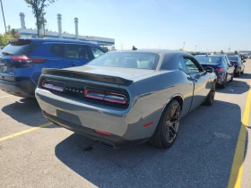 Обява за продажба на Dodge Challenger * SRT HELLCAT* CARFAX * БЕЗ ПЪРВОНАЧАЛНА ВНОСКА ~ 129 000 лв. - изображение 2 | Auto.bg Обява за продажба на Dodge Challenger * SRT HELLCAT* CARFAX * БЕЗ ПЪРВОНАЧАЛНА ВНОСКА ~ 129 000 лв. - изображение 2