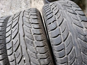 Гуми Зимни 235/65R17, снимка 3 - Гуми и джанти - 37683180