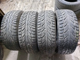 Гуми Зимни 235/65R17, снимка 1 - Гуми и джанти - 37683180