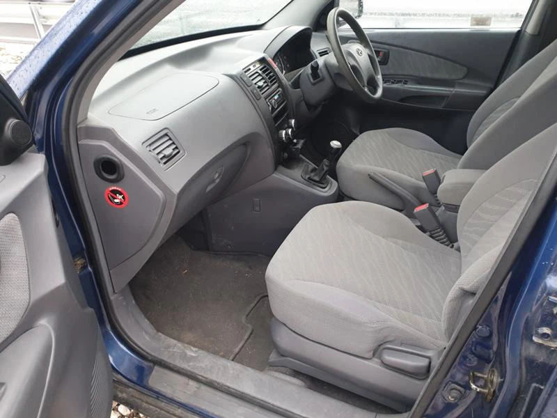 Hyundai Tucson 2.0i, снимка 11 - Автомобили и джипове - 30958181