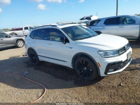 VW Tiguan 2.0L I-4 DI, DOHC, VVT, TURBO, 184HP Front Wheel