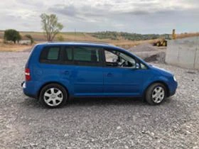 VW Touran 2,0    | Mobile.bg    8