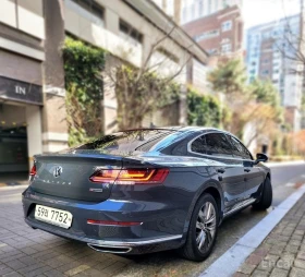 VW Arteon PRESTIGE* AMBIENT* ОБДУХВАНЕ* 4 ПОДГРЕВА* КАМЕРА  - 17200 € / 33640.28 лв. - 75239727 4