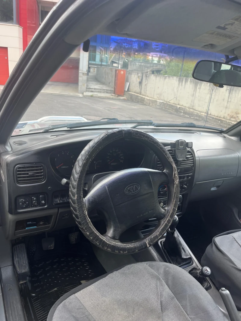 Kia Sportage 2.0, снимка 12 - Автомобили и джипове - 47403212