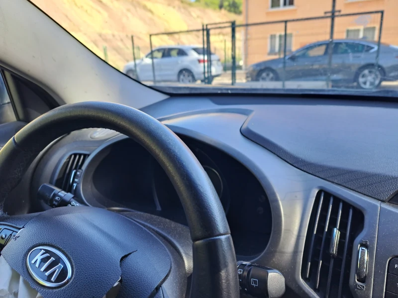 Kia Sportage 1.7crdi, снимка 11 - Автомобили и джипове - 51590192