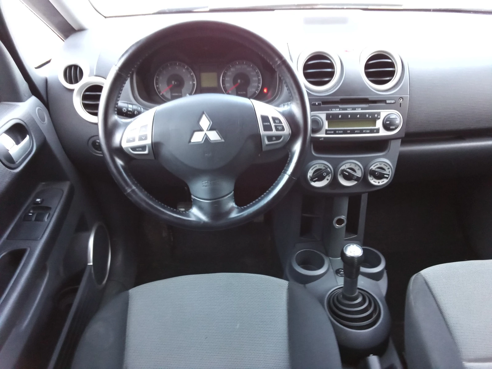 Mitsubishi Colt 1.3i-95kc. - изображение 9