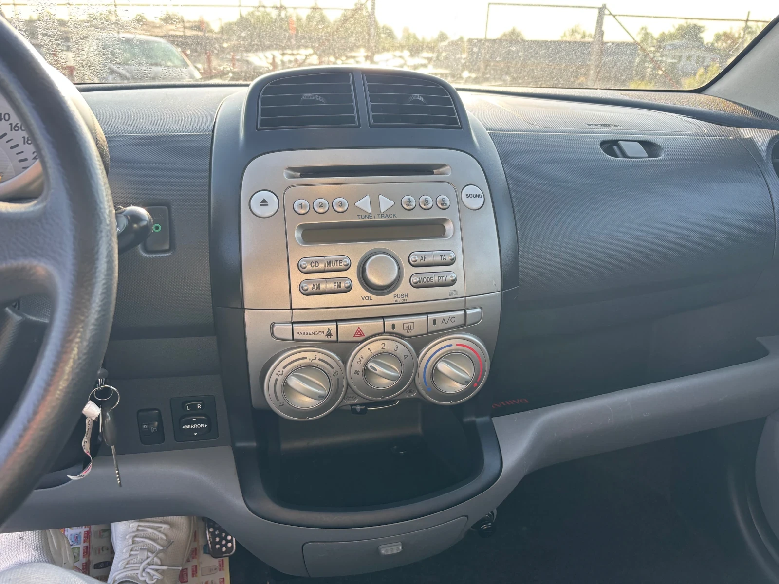 Daihatsu Sirion 1.3-92кс, AC, снимка 11 - Автомобили и джипове - 54498246