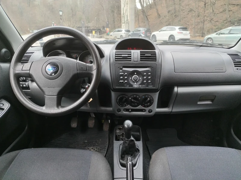 Subaru G3x justy 1.3i/4x4!!!, снимка 10 - Автомобили и джипове - 48146319