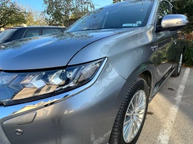 Обява за продажба на Mitsubishi Outlander 2.4 Plug-in Hybrid 4WD ~41 900 лв. - изображение 1 | Auto.bg Обява за продажба на Mitsubishi Outlander 2.4 Plug-in Hybrid 4WD ~41 900 лв. - изображение 1